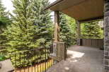 Enjoy the serene beauty of nature from this expansive covered porch, perfect for outdoor living and entertaining.