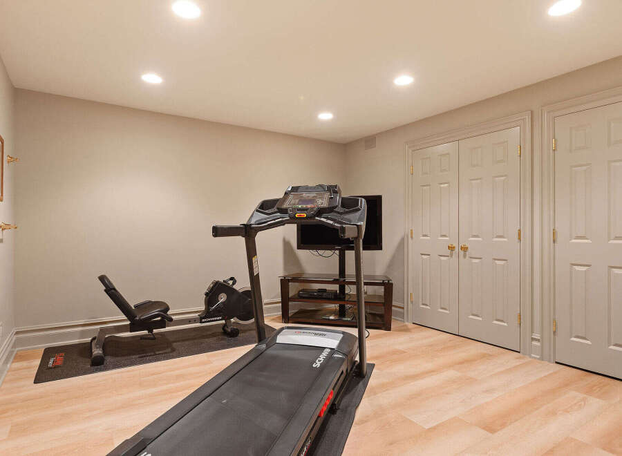 Transform your home into a personal fitness sanctuary with this dedicated gym space.