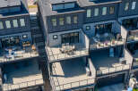 Experience modern urban living in this stunning townhouse featuring multiple levels of outdoor living space.