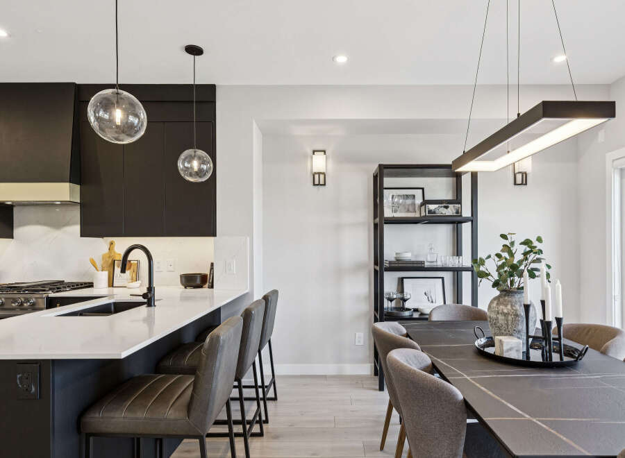 Experience modern living in this stunning open-concept kitchen and dining area.