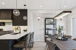 Experience modern living in this stunning open-concept kitchen and dining area.