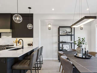 Experience modern living in this stunning open-concept kitchen and dining area.