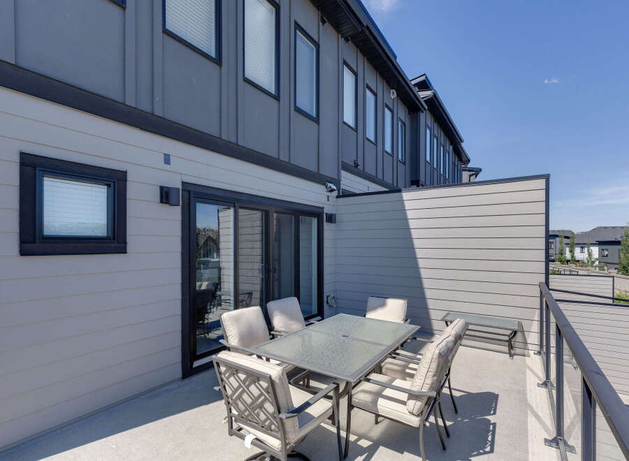 Enjoy outdoor living on this spacious patio, perfect for al fresco dining and entertaining.