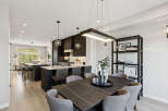 Experience modern luxury in this stunning open-concept kitchen and dining area.