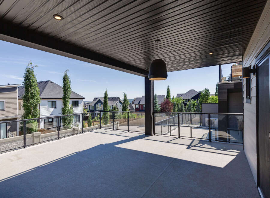 Enjoy breathtaking views from this expansive covered deck, perfect for entertaining or relaxing.