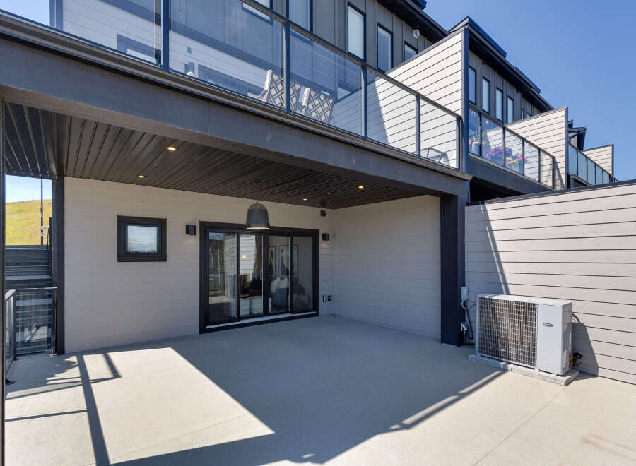 Enjoy outdoor living on this spacious patio, perfect for entertaining or relaxing.