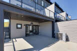 Enjoy outdoor living on this spacious patio, perfect for entertaining or relaxing.