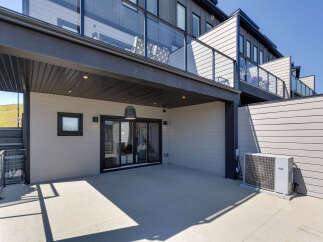 Enjoy outdoor living on this spacious patio, perfect for entertaining or relaxing.