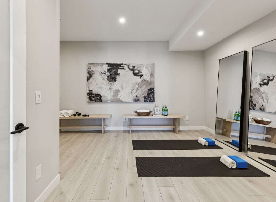 Transform your home into a personal sanctuary with this dedicated yoga and wellness space.