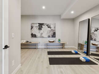 Transform your home into a personal sanctuary with this dedicated yoga and wellness space.