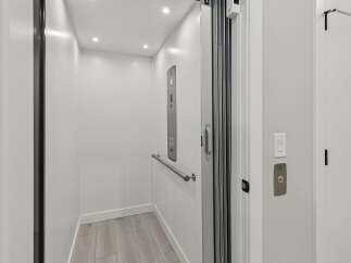 Experience seamless vertical living in this modern elevator, designed for convenience and accessibility.