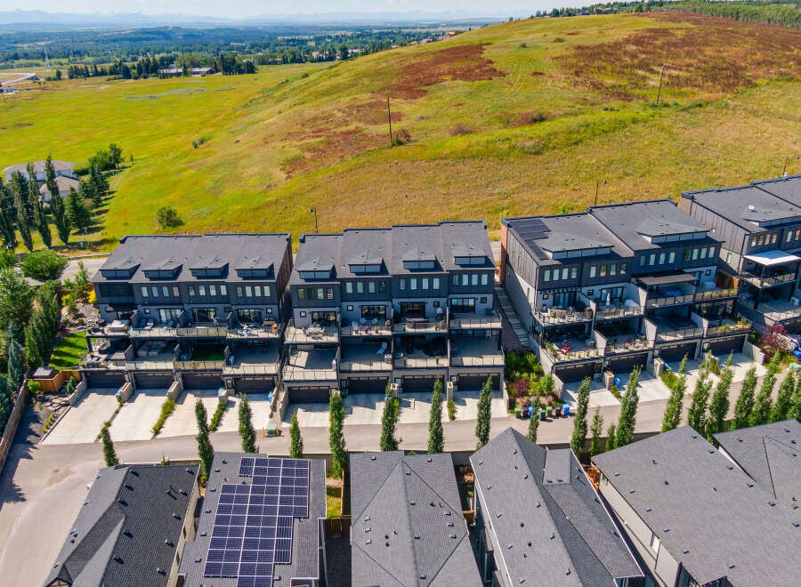 Discover modern living in this stunning townhouse complex, featuring sleek architecture and spacious multi-level balconies perfect for outdoor entertaining.