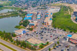 Discover this vibrant commercial hub featuring a mix of retail spaces and essential services, including a bank and a drug store.