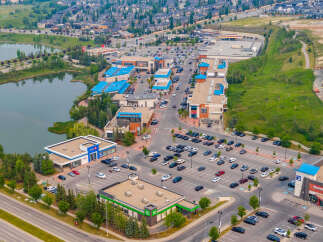 Discover this vibrant commercial hub featuring a mix of retail spaces and essential services, including a bank and a drug store.