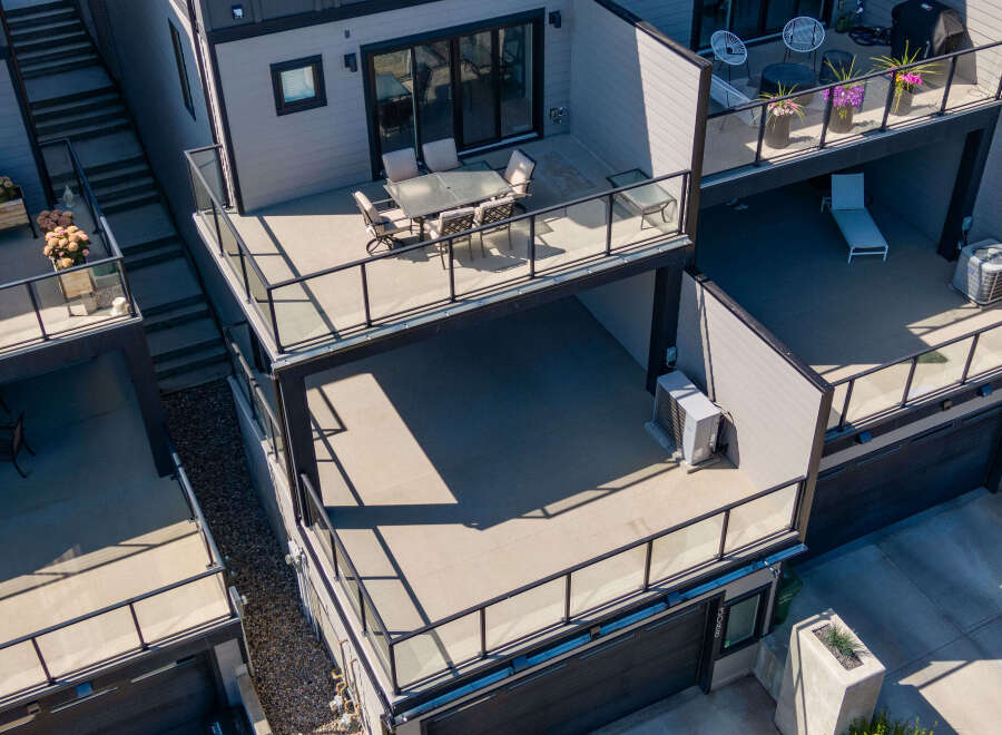 Experience modern urban living with this stunning multi-level townhouse featuring expansive outdoor spaces.