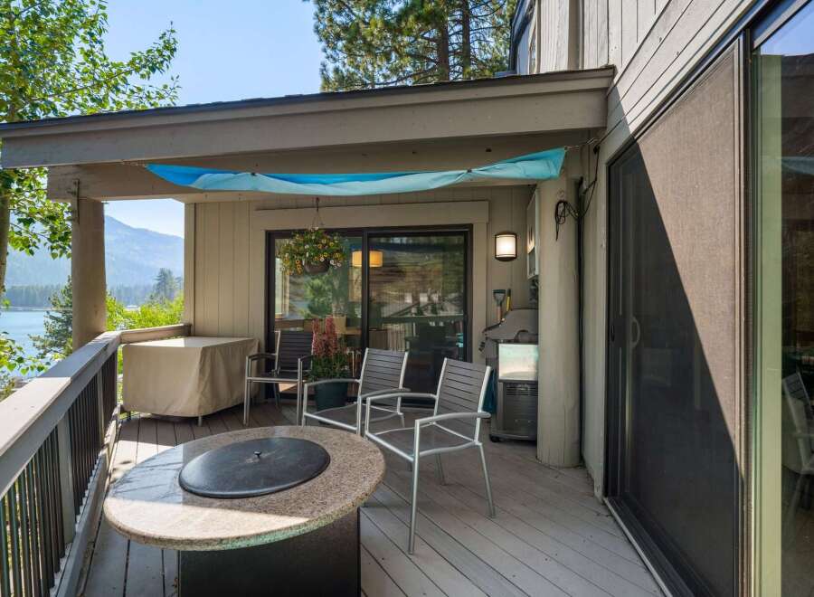Enjoy breathtaking lake and mountain views from this stunning deck, perfect for outdoor entertaining.