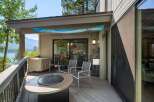 Enjoy breathtaking lake and mountain views from this stunning deck, perfect for outdoor entertaining.