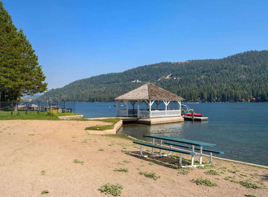 Enjoy lakeside living with this charming property featuring a private gazebo and dock, perfect for summer days on the water.