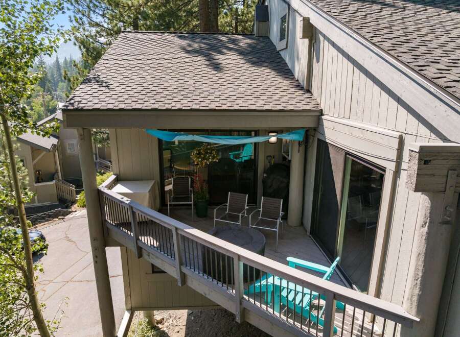 Enjoy outdoor living on this spacious deck, perfect for entertaining or relaxing.