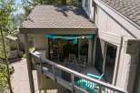 Enjoy outdoor living on this spacious deck, perfect for entertaining or relaxing.