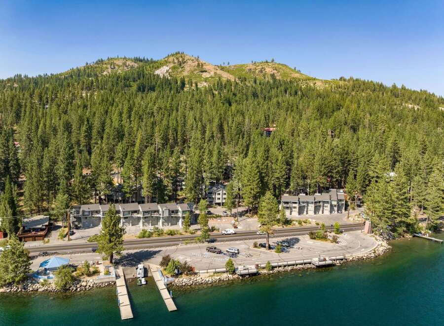 Experience lakeside living with this stunning property featuring direct water access and private boat docks.