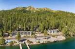 Experience lakeside living with this stunning property featuring direct water access and private boat docks.