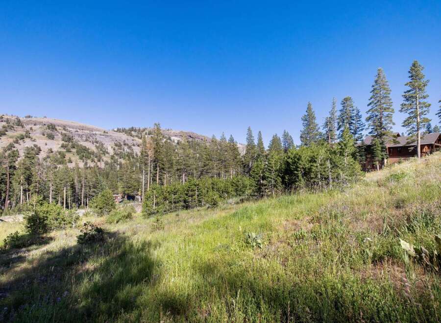 Nestled amidst a serene mountain landscape, this property offers a tranquil retreat with stunning natural beauty.