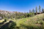Nestled amidst a serene mountain landscape, this property offers a tranquil retreat with stunning natural beauty.