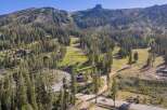 Nestled amidst a lush pine forest, this stunning mountain property offers breathtaking views and serene seclusion.