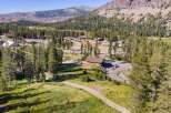 Nestled amidst a serene pine forest and rolling hills, this property offers a unique opportunity for development or a private mountain retreat.