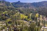 Nestled amidst a lush pine forest, this stunning mountain property offers breathtaking views and a serene escape.