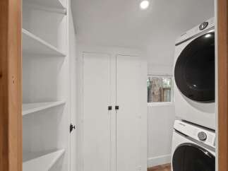 Discover efficient living with this stacked Samsung washer and dryer set, perfect for maximizing space in your laundry area.