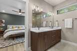 Experience modern luxury in this stunning bedroom and en-suite bathroom.