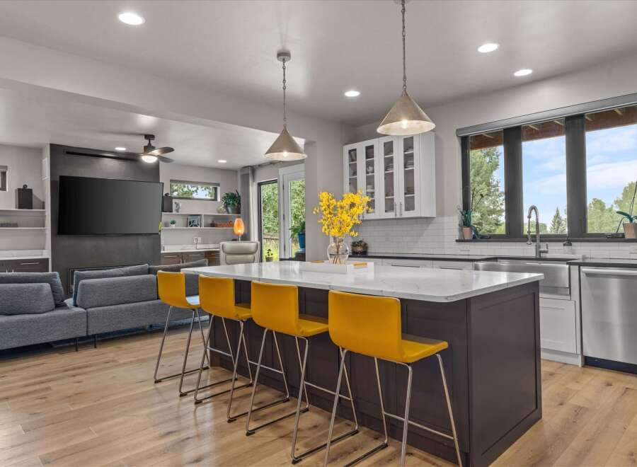 Experience modern living in this stunning open-concept kitchen and living area, perfect for entertaining.