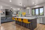 Experience modern living in this stunning open-concept kitchen and living area, perfect for entertaining.