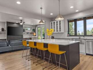 Experience modern living in this stunning open-concept kitchen and living area, perfect for entertaining.
