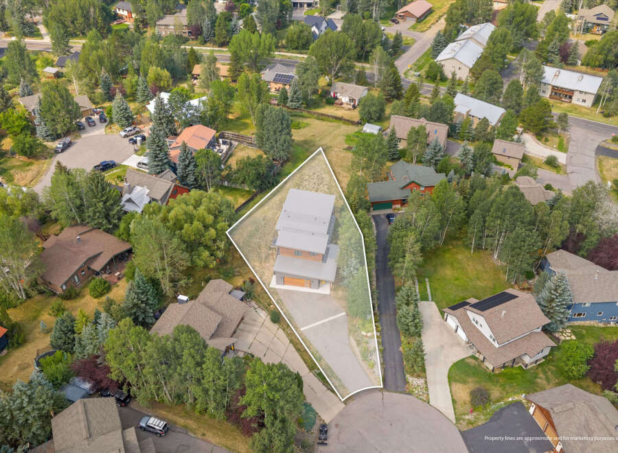Discover this stunning modern home, a true architectural gem nestled in a serene, tree-lined neighborhood.