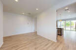 Experience modern living in this spacious home featuring an open-concept layout with gleaming hardwood floors.