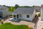 Discover this charming home featuring a covered patio perfect for outdoor relaxation and entertaining.