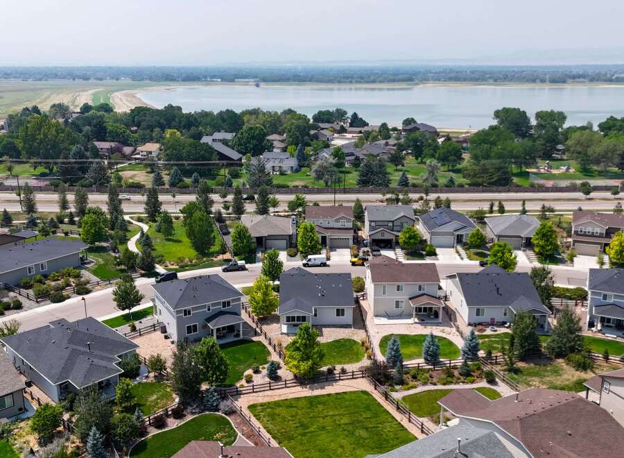 Discover this stunning suburban neighborhood featuring modern homes with spacious yards and beautiful landscaping.