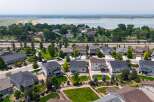 Discover this stunning suburban neighborhood featuring modern homes with spacious yards and beautiful landscaping.
