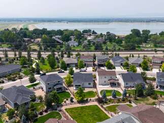 Discover this stunning suburban neighborhood featuring modern homes with spacious yards and beautiful landscaping.