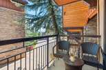 Enjoy your morning coffee or evening wine on this charming balcony, complete with two comfortable wicker chairs and a small table.