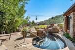 Experience luxury mountain living with this stunning property featuring a private hot tub and breathtaking views.