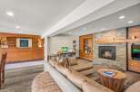 Experience comfort and style in this inviting living space, featuring a plush sectional sofa perfect for relaxation.