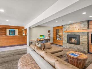 Experience comfort and style in this inviting living space, featuring a plush sectional sofa perfect for relaxation.
