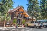 Experience the charm of The Crestwood, a distinguished hotel nestled amidst towering pine trees.