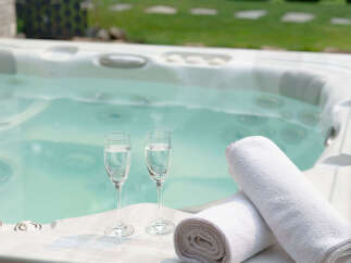 Indulge in ultimate relaxation with this luxurious hot tub, perfect for unwinding after a long day.