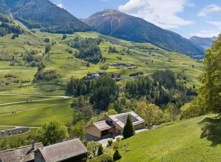 Experience breathtaking mountain views from this stunning property nestled in a serene valley.
