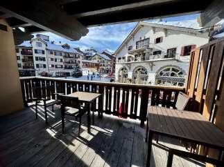 Enjoy breathtaking mountain views from this charming balcony, perfect for morning coffee or evening relaxation.